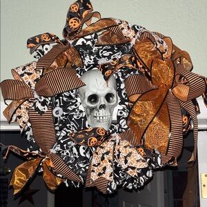 Beautiful homemade, full Halloween Skull Wreath with Orange and Black Ribbons